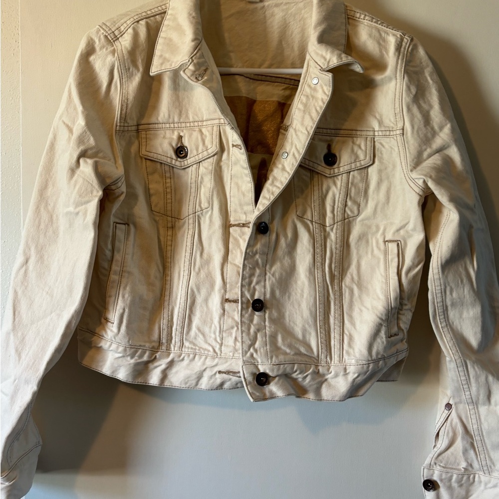 Tom’s white Jean jacket